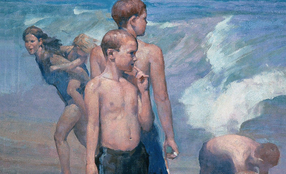 boys playing on a beach